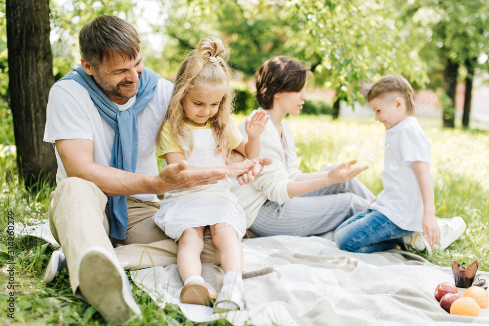 Father playing with his daughter in the park. Father playing with his daughter in the park.