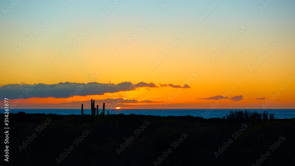 Fototapeta premium Landscape with The Atlantic Ocean at sunset