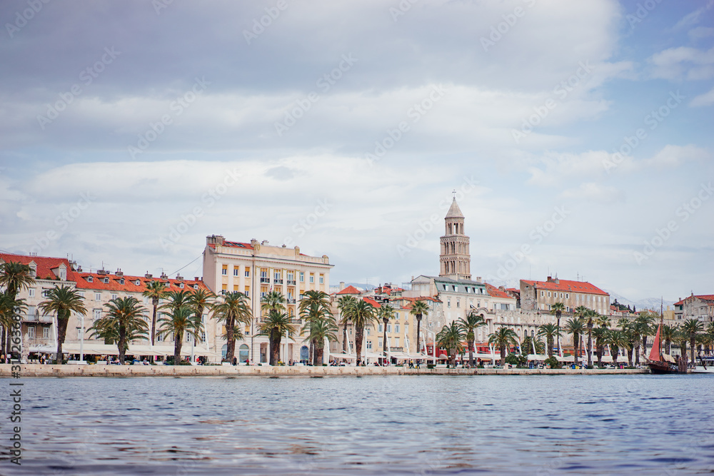 Travel by Croatia. Beautiful landscape with Split Old Town on sea promenade.