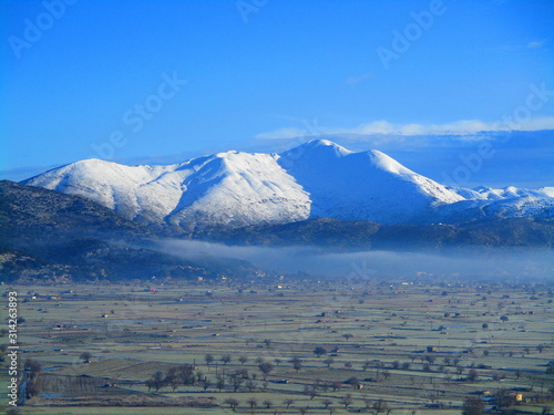 Selena mountain in snow in Lasithi Plateau