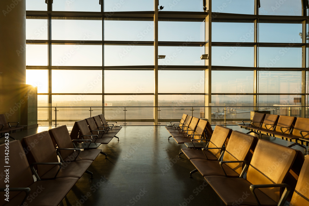 Chairs in modern airport terminal