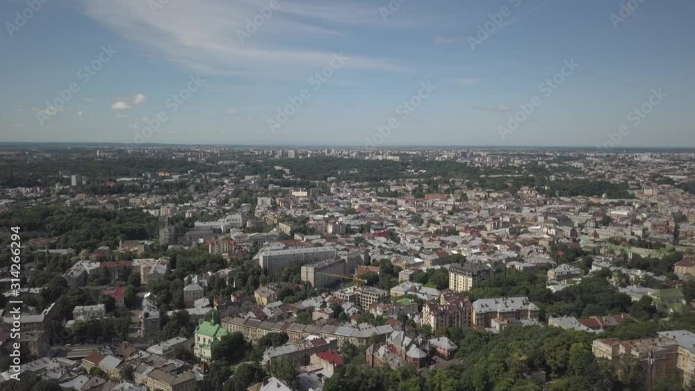 Lviv, Ukraine - 7 7 2019:Panorama of the central part of the city with a quadrocopter. Aerial drone of tourist attractions. Great weekend break. Former territory of Poland and Austria-Hungary. Lviv, Ukraine - 7 7 2019:Panorama of the central part of the city with a quadrocopter. Aerial drone of tourist attractions. Great weekend break. Former territory of Poland and Austria-Hungary.