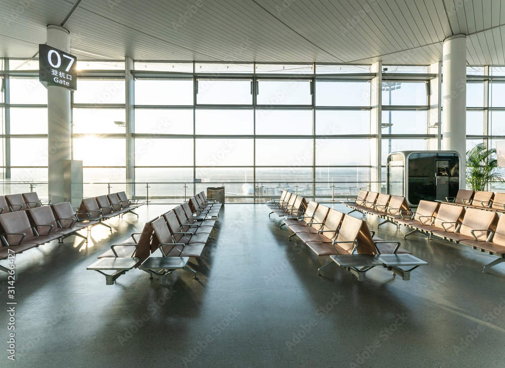 Chairs in modern airport terminal