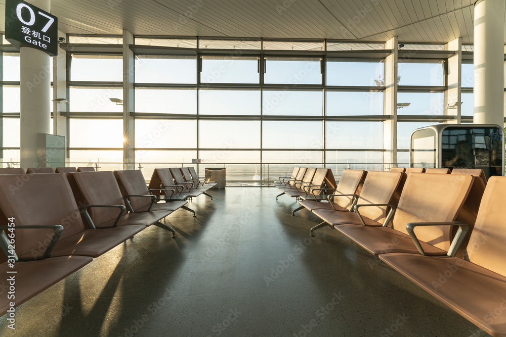 Chairs in modern airport terminal