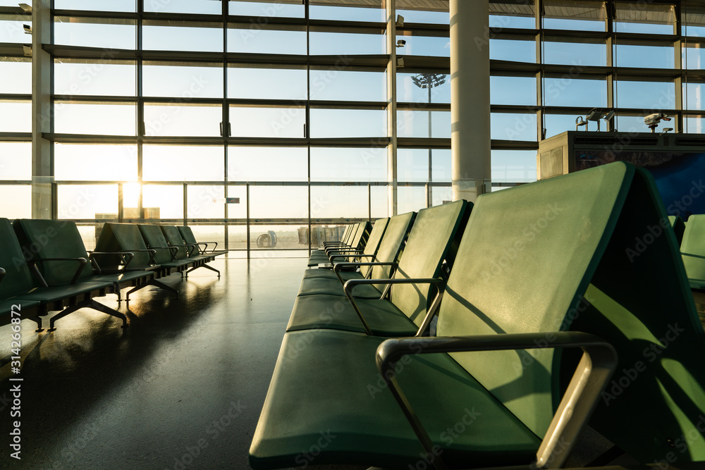 Chairs in modern airport terminal