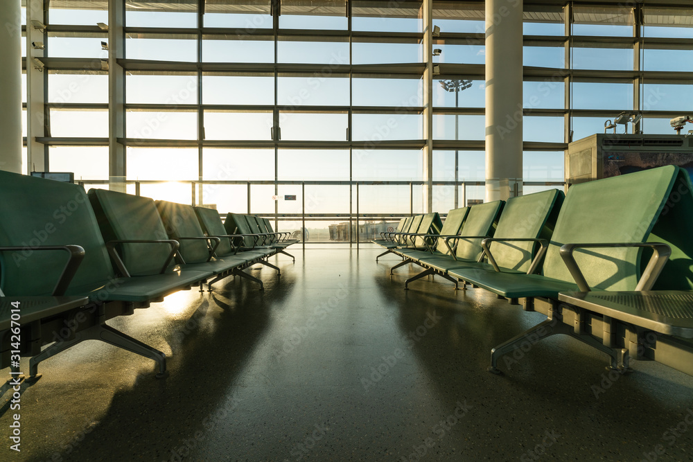 Chairs in modern airport terminal