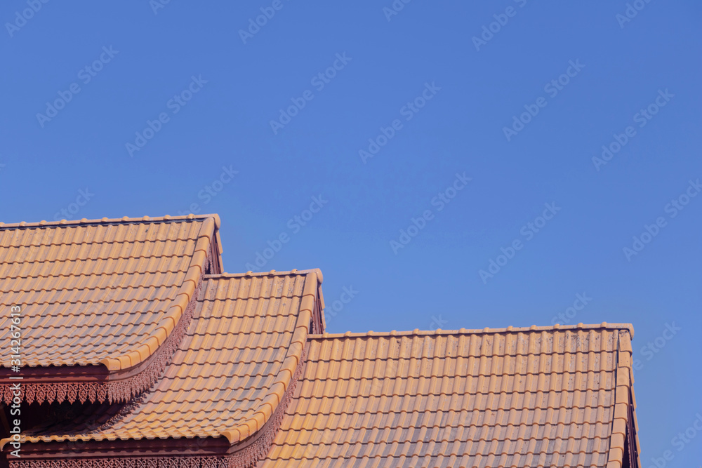 Thai roof Church at Thai temple.Roof style of thai temple under blue sky. architecture of roof, Thailand. Thai roof Church at Thai temple.Roof style of thai temple under blue sky. architecture of roof, Thailand.