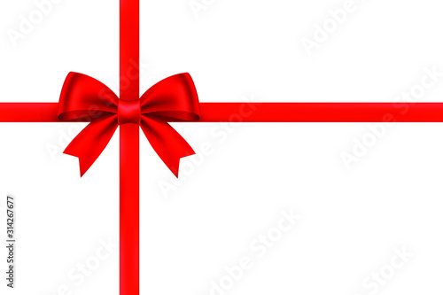 Shiny red ribbon bow on white background. Festival or holiday gift concept.