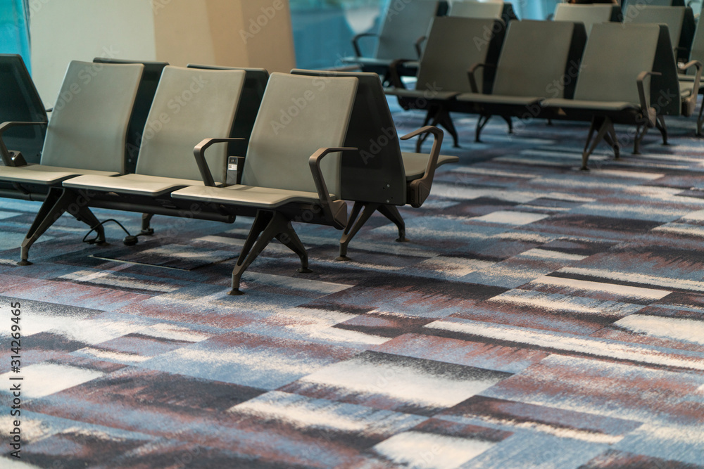 Chairs in modern airport terminal