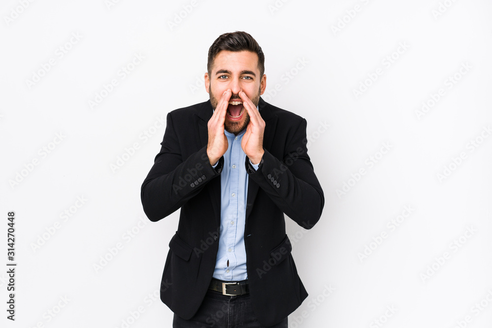 Young caucasian business man against a white background isolated shouting excited to front. Young caucasian business man against a white background isolated shouting excited to front.