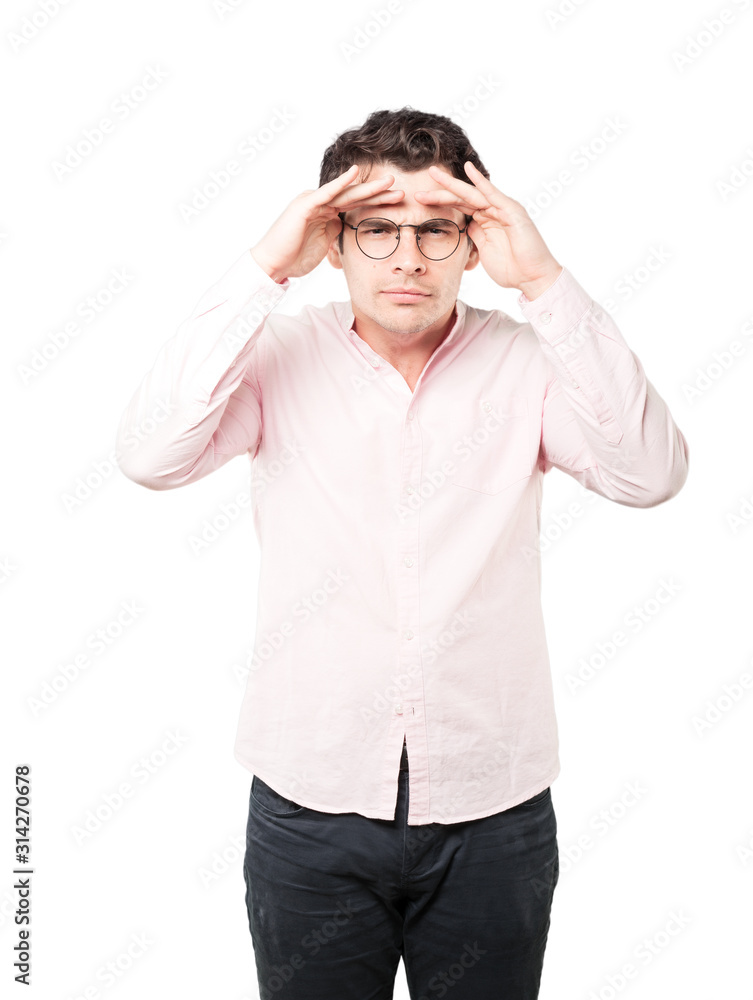 Concentrated young man with a gesture of looking away Concentrated young man with a gesture of looking away