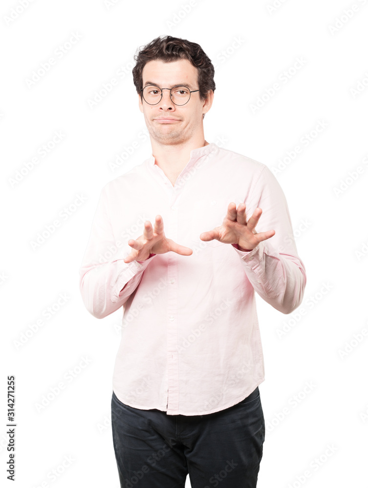 Haughty young man making a contemptuous gesture Haughty young man making a contemptuous gesture