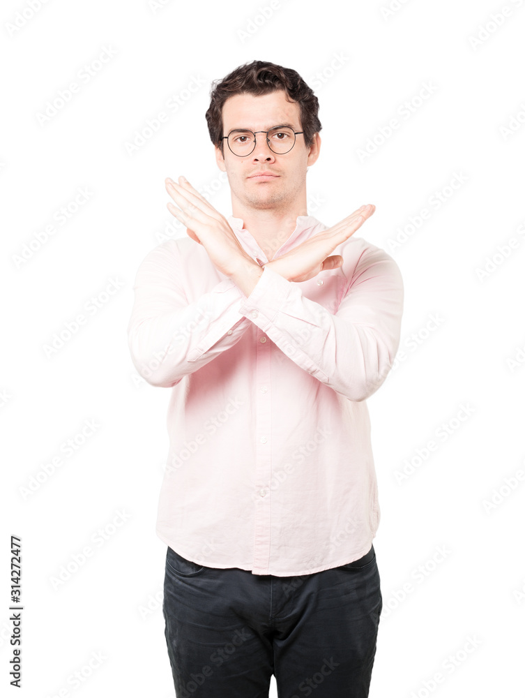 Young man making a gesture of not crossing with the arms Young man making a gesture of not crossing with the arms