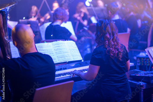 Canvas Print Artis playing digital piano at the concert