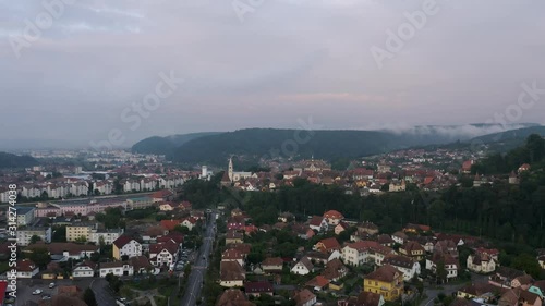 4k Lowering Drone Shot Sighisoara Holy Trinity Church Târnava Mare River photo