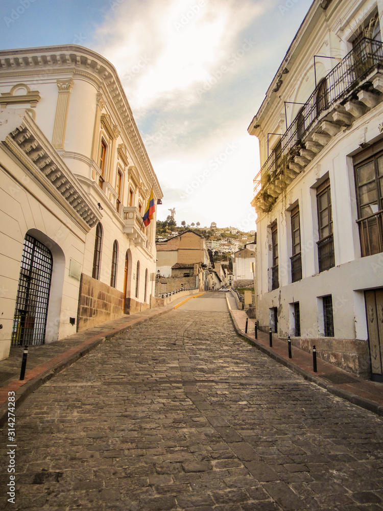 Street in the historic district of Quito, Ecuador, overlooking the Virgen del Panecillo