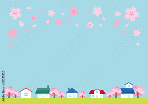 Fototapeta Naklejka Na Ścianę i Meble -  かわいい家が並ぶ桜舞い踊る春の街並みの風景