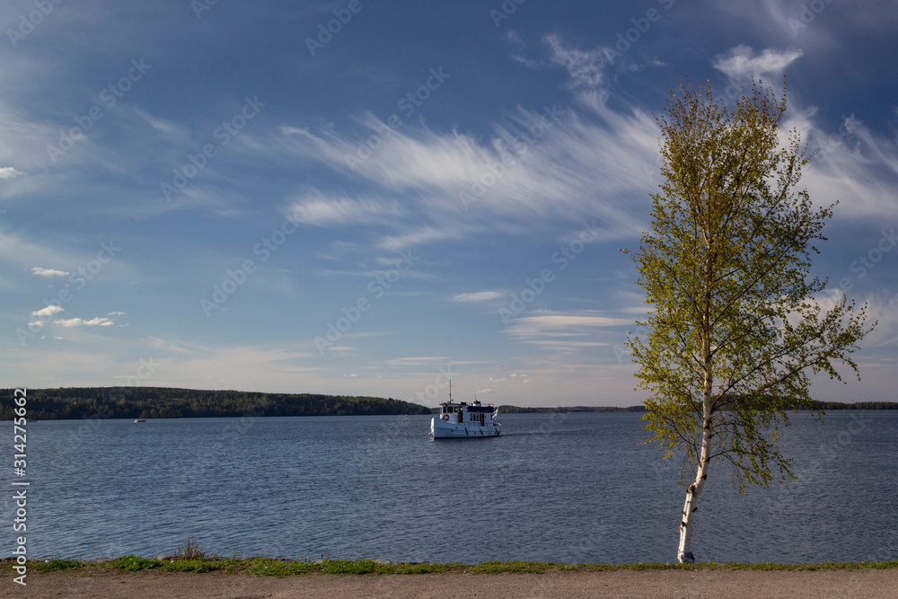 Boat on the lake Vesijärvi on a spring day in Lahti/ Finland