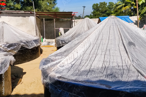 fish farm inside. containers with water and fish. photo