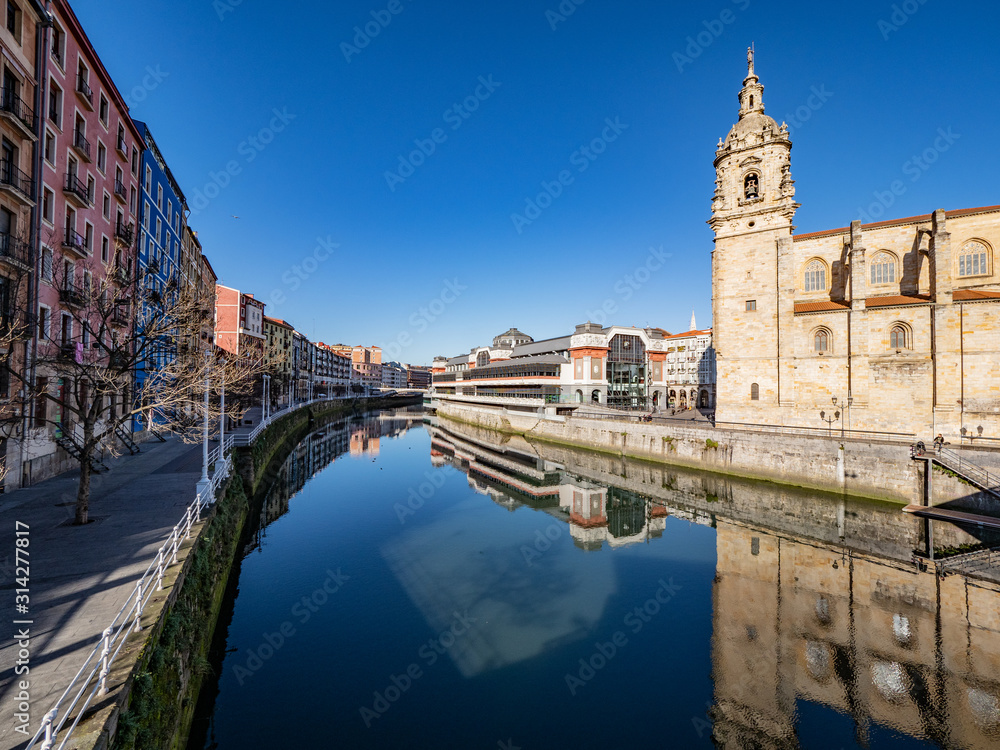Ria de Bilbao with the church of San Anton, in the seven streets, old town, in the Basque country.
