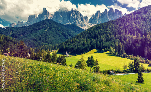 Wonderful Sunny Landscape of Dolomite Alps. Countryside view of the St. Magdalena or Santa Maddalena in the National Park Puez Odle or Geisler summits. Dolomites, South Tyrol. Bolzano, Italy, Europe. © jenyateua
