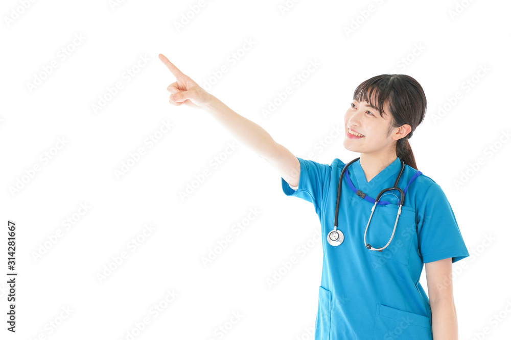 指をさす笑顔の若いナース 指をさす笑顔の若いナース