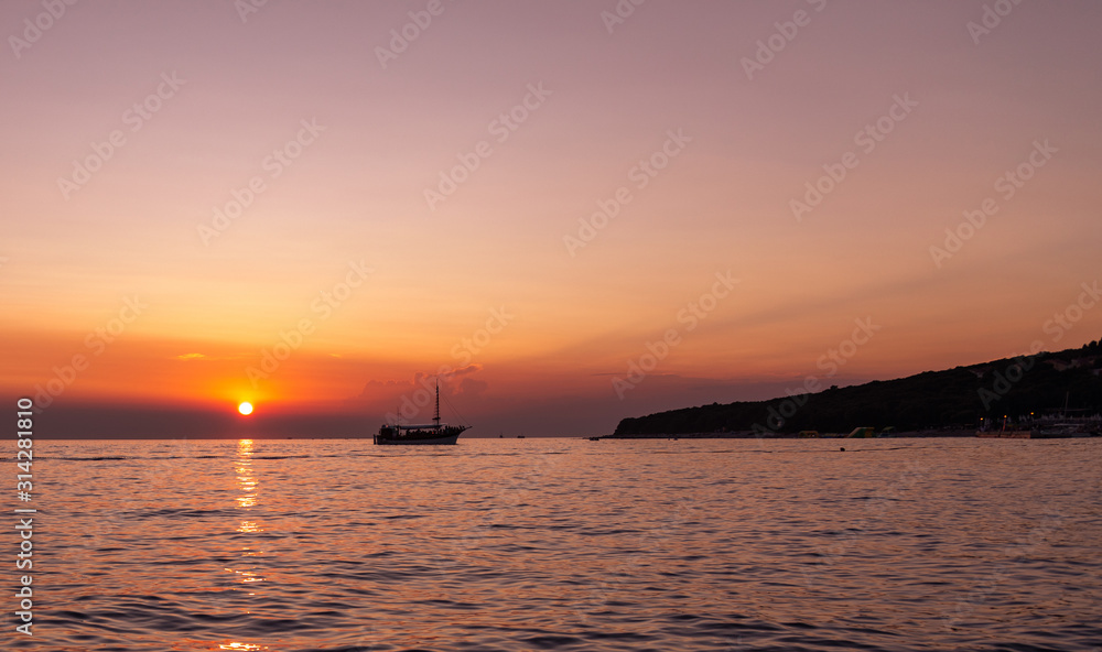 Boat. Sun. Set. Sky. Orange. Sea. Istria