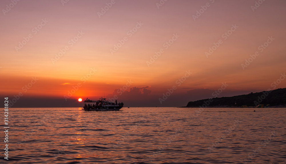 Boat. Sun. Sky. Orange. Sea. Istria