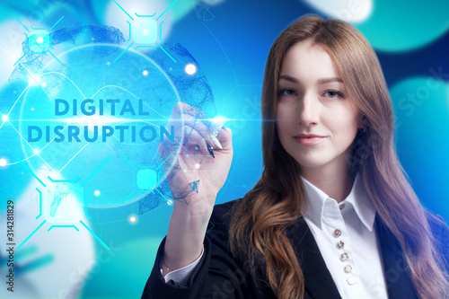 Business, Technology, Internet and network concept. Young businessman working on a virtual screen of the future and sees the inscription: digital disruption