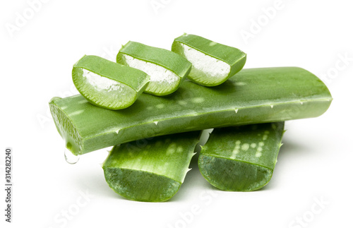 Aloe vera pieces of leaf isolated on white background. Drop of juice from leaf.