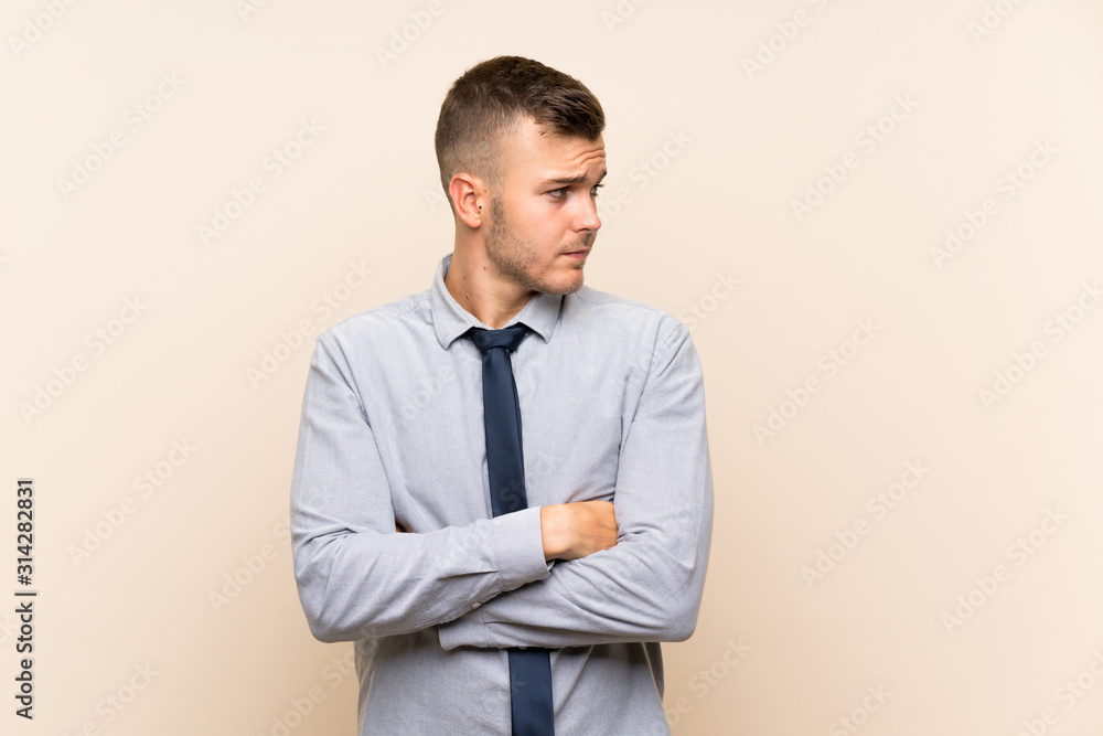 Young blonde businessman over isolated background thinking an idea Young blonde businessman over isolated background thinking an idea