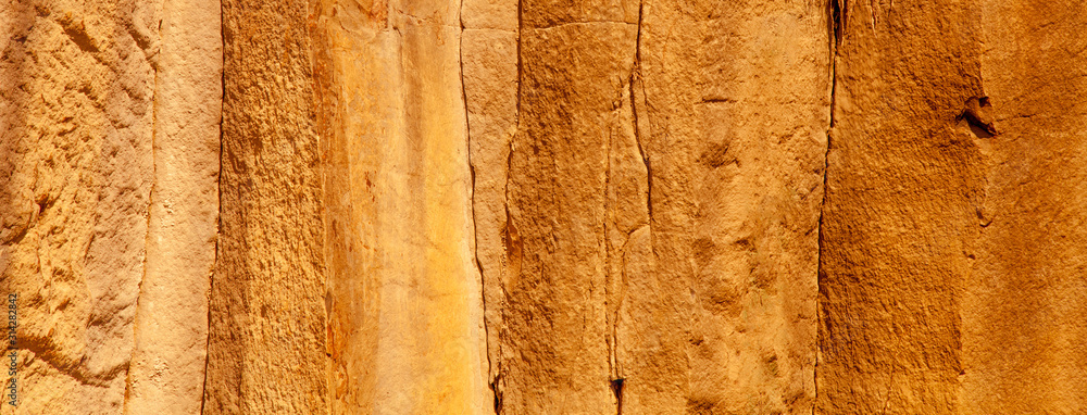 Fototapeta premium Image of ancient prehistoric stone wall texture background. Horizontal image.