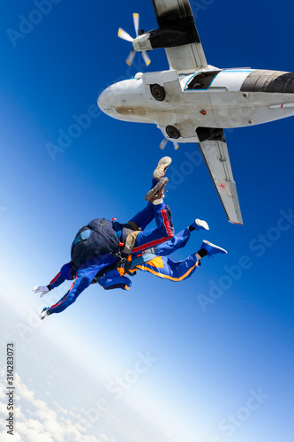 Tandem jump. The instructor and the student in free fall.