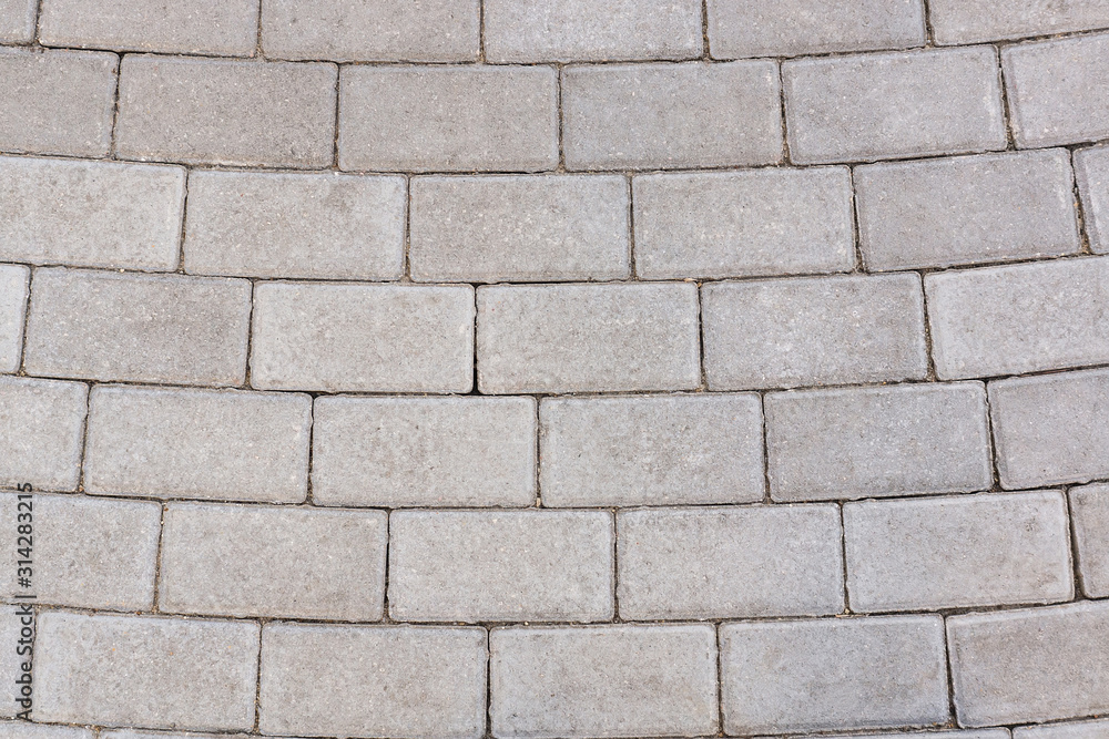 Fototapeta premium Outdoor walkway with white cobblestone.