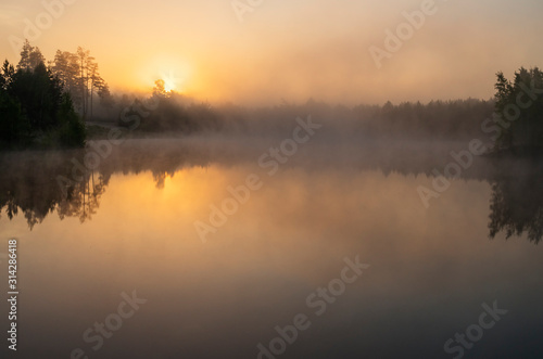 Misty morning on the lake. © Eugene