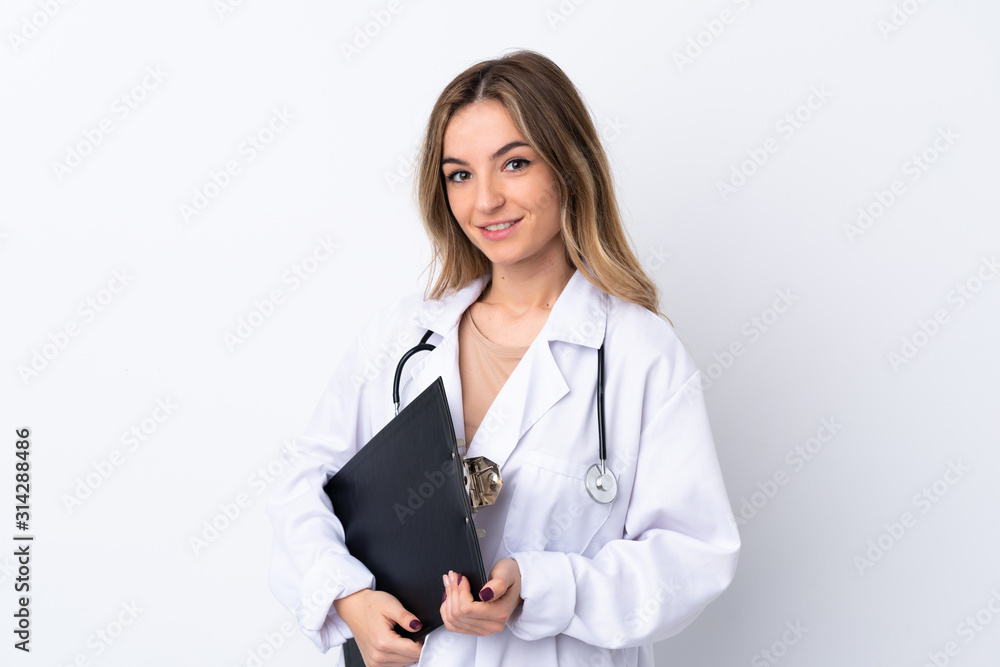 Young woman over isolated white background wearing a doctor gown and holding a folder Young woman over isolated white background wearing a doctor gown and holding a folder