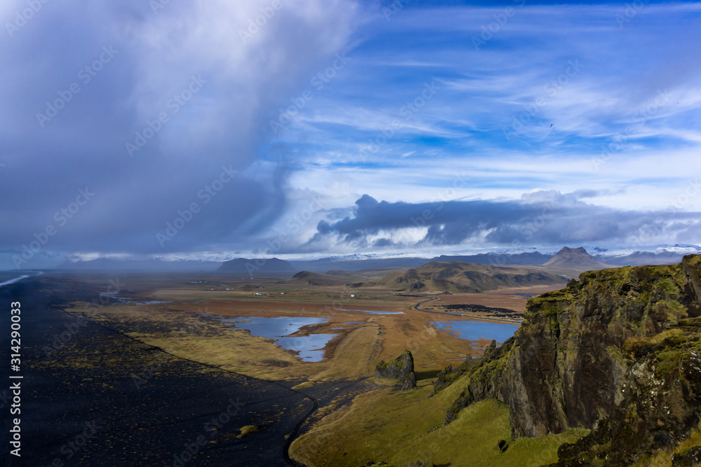 Beautiful landscape. Mountains, lakes, beach, ocean and clouds all at once Beautiful landscape. Mountains, lakes, beach, ocean and clouds all at once