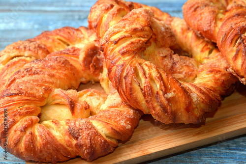 Fresh pastries bakery products, on wooden table