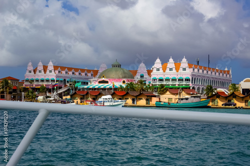 View of the main harbor on Aruba - the city and boats. Dutch province named Oranjestad, Aruba - beautiful Caribbean Island.
