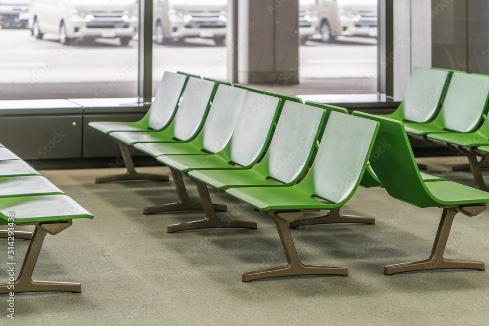 Chairs in modern airport terminal