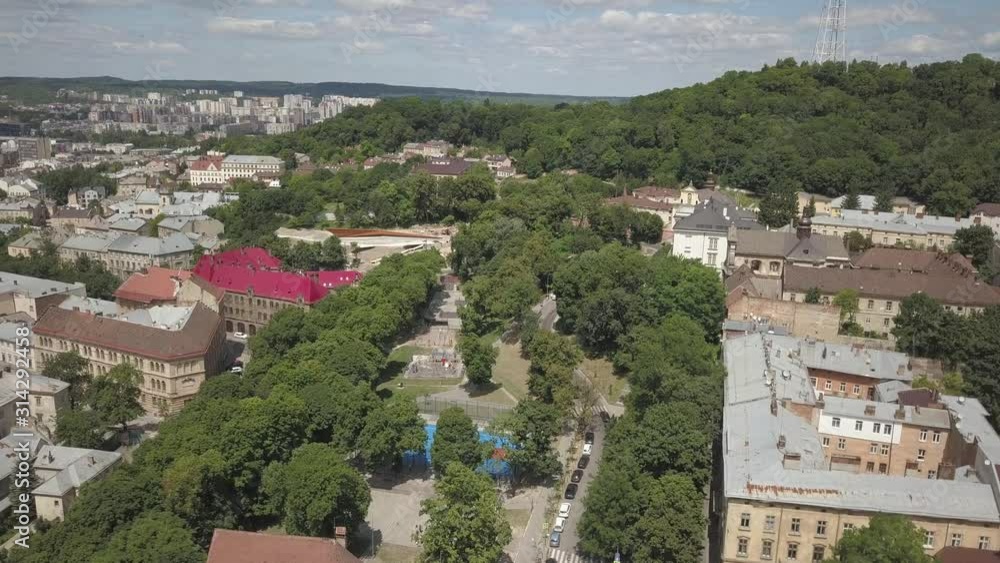 Lviv, Ukraine - 7 7 2019:Panorama of the central part of the city with a quadrocopter. Aerial drone of tourist attractions. Great weekend break. Former territory of Poland and Austria-Hungary. Lviv, Ukraine - 7 7 2019:Panorama of the central part of the city with a quadrocopter. Aerial drone of tourist attractions. Great weekend break. Former territory of Poland and Austria-Hungary.