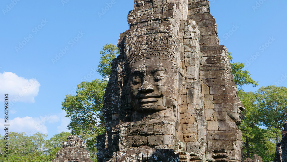 Face tower at the Bayon Temple in Angkor wat complex, Siem Reap Cambodia