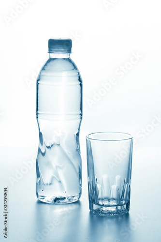 Plastic bottles placed together with glass.