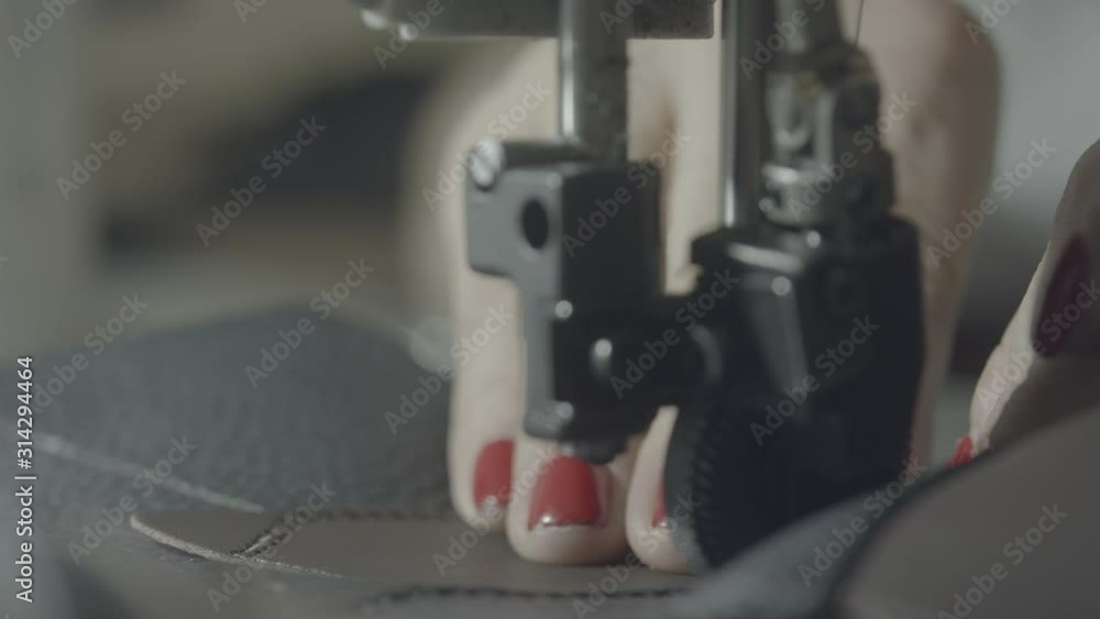 Sewing machine. Shoe factory process of making shoes using machines and technologies Sewing machine. Shoe factory process of making shoes using machines and technologies