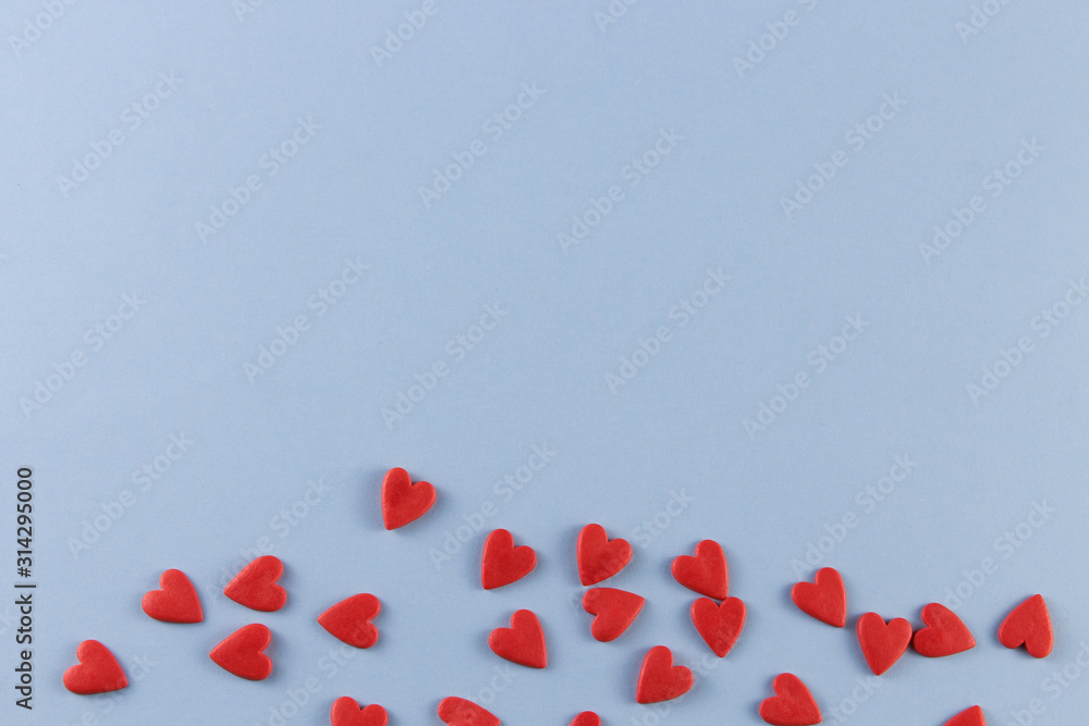 red hearts on a white background with place for text.