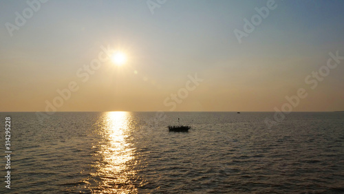 Beautiful sunset landscape view of Tonle Sap lake in Siem Reap, Cambodia. © BabyQ