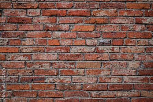 Countryside brick style old house orange wall.