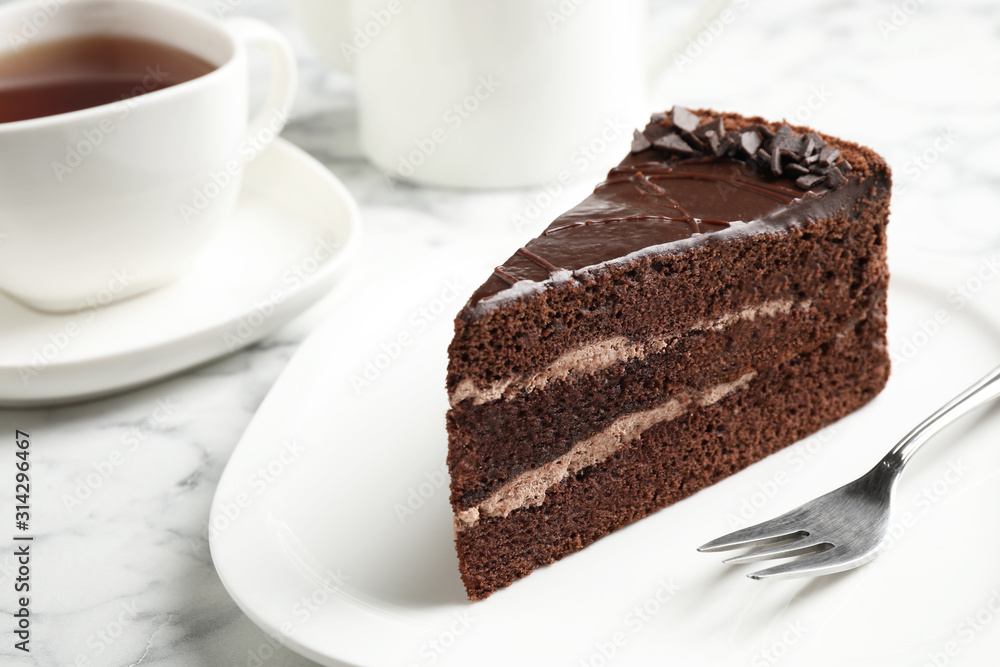 Piece of tasty chocolate cake served on plate Piece of tasty chocolate cake served on plate