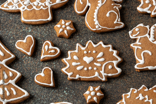 Homemade Christmas gingerbread cookies on a dark background