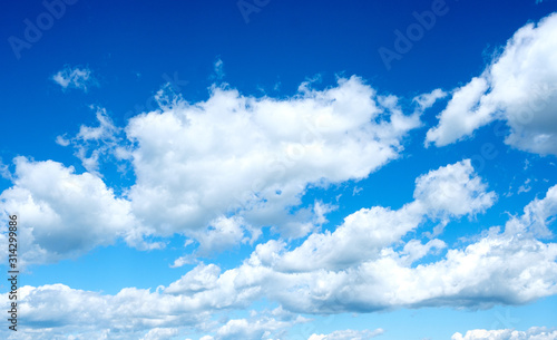 Fototapeta Naklejka Na Ścianę i Meble -  white clouds on a blue sky on a summer day